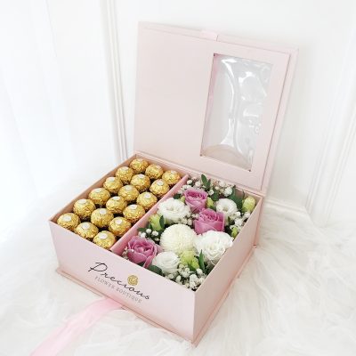 flower gift box with ferrero rocher, purple rose and white eustoma, ping pong chrysanthemum and baby’s breath in pink box.