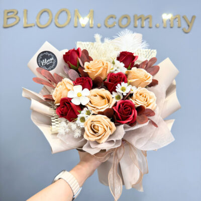 wrapped bouquet with red soap roses, milktea soap roses, white soap chamomile and dried violet flowers in soft neutral tones